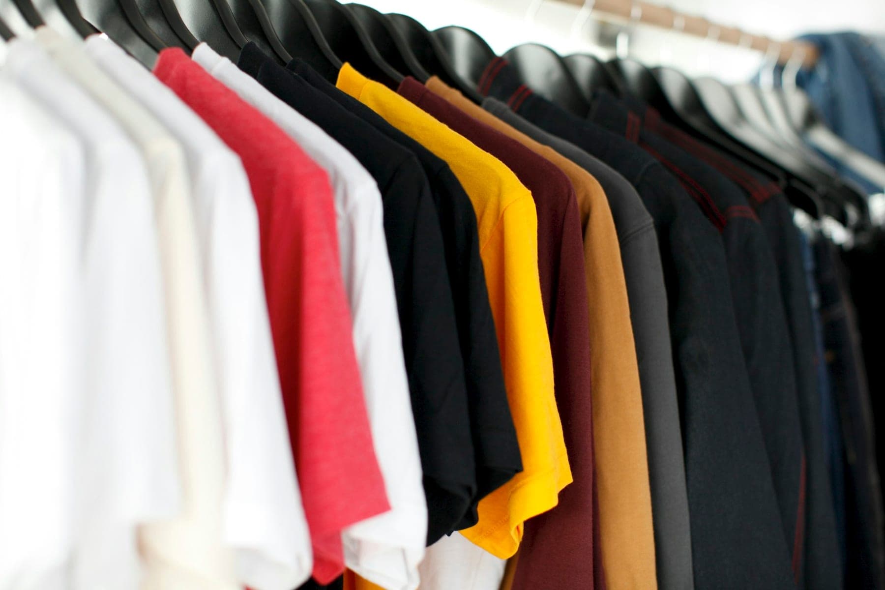 Neutral hanging apparel assortment for custom sportswear and activewear programs