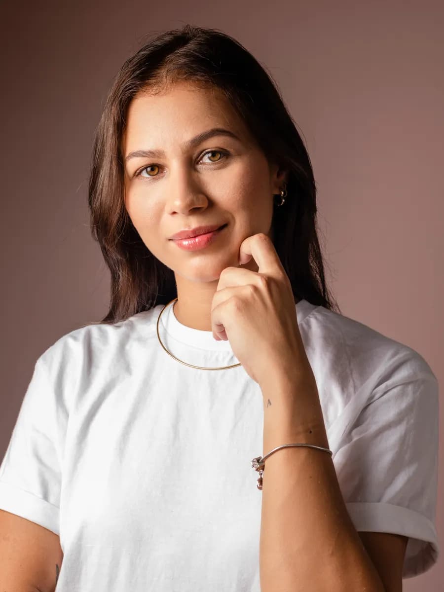 Adult model style reference — Young woman in white t-shirt portrait